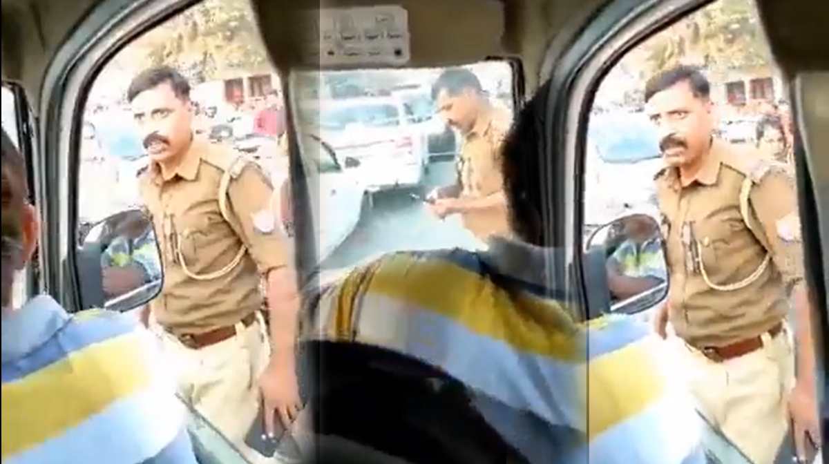Policeman threatens