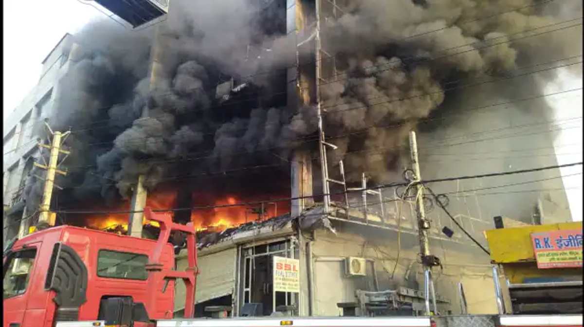 Fire breaks out in three-storey building